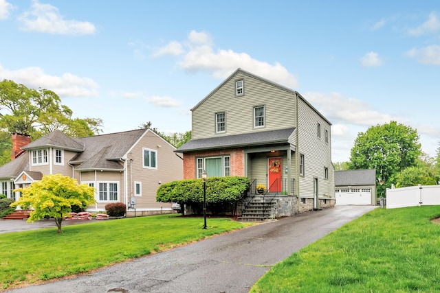 8 Thomas St, Trumbull, CT 06611 - view of front of property featuring a detached garage and an outdoor structure