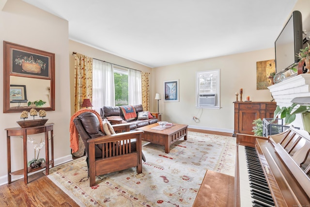 8 Thomas St, Trumbull, CT 06611 - living room with baseboards, light wood finished floors, and cooling unit