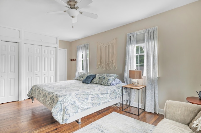8 Thomas St, Trumbull, CT 06611 - bedroom with wood finished floors, a ceiling fan, multiple closets, and baseboards