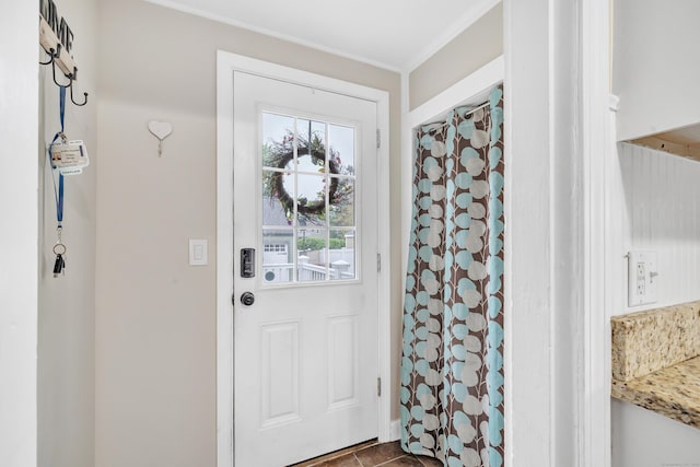 8 Thomas St, Trumbull, CT 06611 - entryway featuring ornamental molding and dark tile patterned flooring