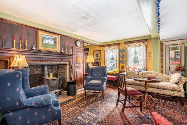 1066 Washington St, Middletown, CT 06457 - living area with a wood stove and wood finished floors