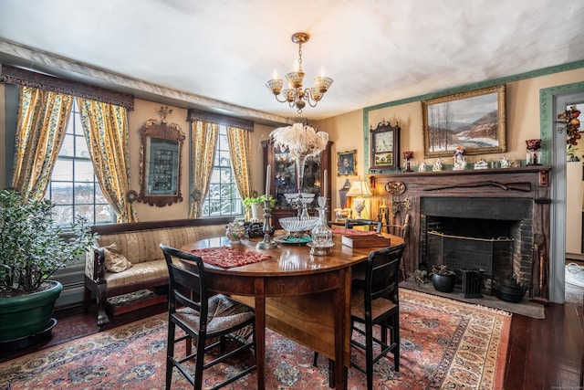 1066 Washington St, Middletown, CT 06457 - dining space featuring a chandelier, healthy amount of natural light, wood finished floors, and a fireplace