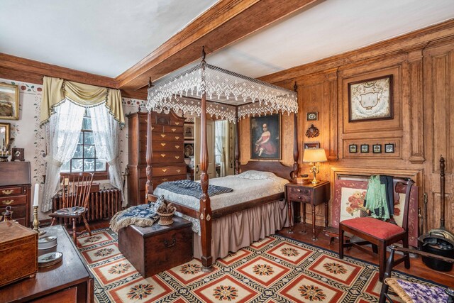 1066 Washington St, Middletown, CT 06457 - bedroom featuring radiator heating unit and wooden walls