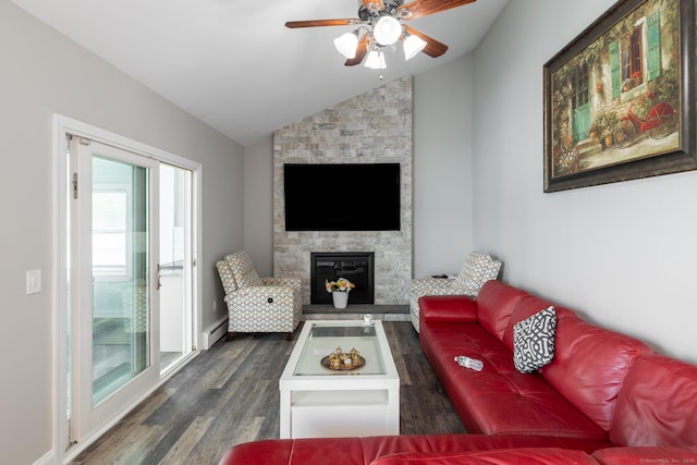 105 Reussner Rd, Southington, CT 06489 - living area featuring a baseboard heating unit, lofted ceiling, a stone fireplace, dark wood-type flooring, and a ceiling fan