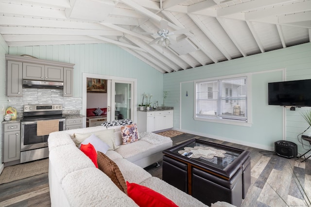 105 Reussner Rd, Southington, CT 06489 - living area with hardwood / wood-style floors, wooden walls, and a ceiling fan