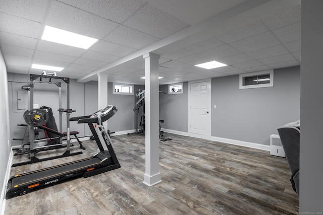 105 Reussner Rd, Southington, CT 06489 - workout area featuring wood finished floors, a paneled ceiling, and baseboards