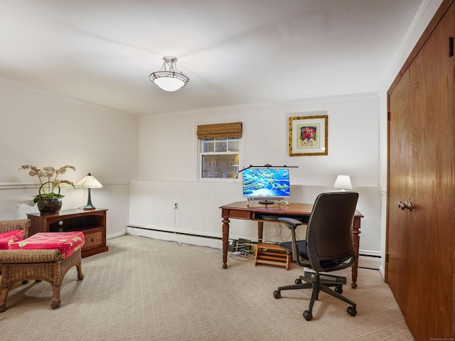 office featuring a baseboard heating unit, ornamental molding, and carpet floors