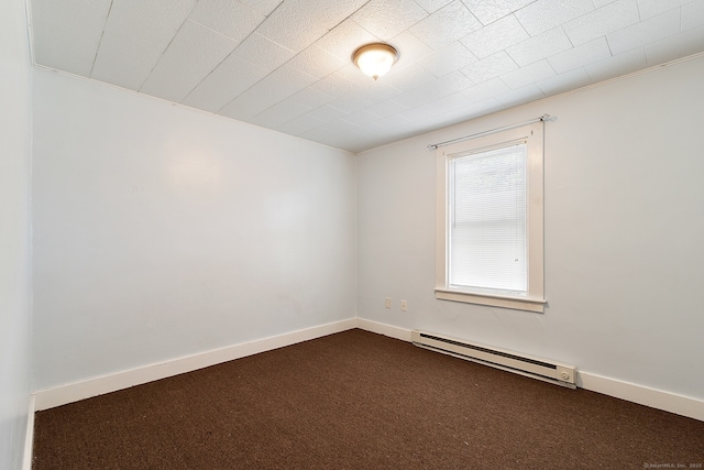 14 Palmer St, Killingly, CT 06239 - unfurnished room featuring a baseboard heating unit, dark colored carpet, ornamental molding, and baseboards