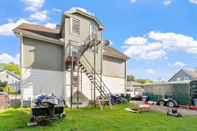 14 Palmer St, Killingly, CT 06239 - rear view of house featuring a chimney