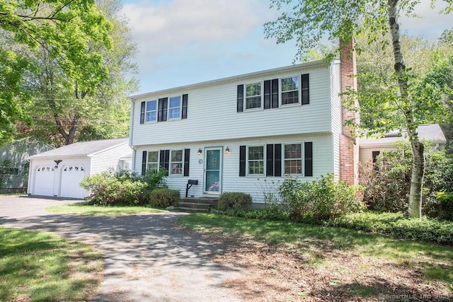 47 Hillside Ave, Farmington, CT 06085 - colonial inspired home with a chimney and a detached garage