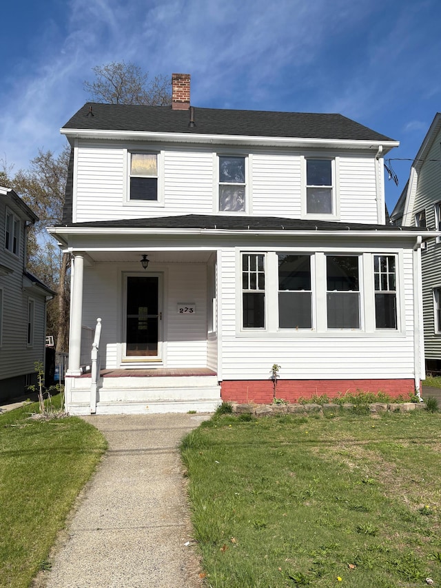 273 Peck Ave, West Haven, CT 06516 - view of front of home featuring a chimney, a front lawn, covered porch, and roof with shingles