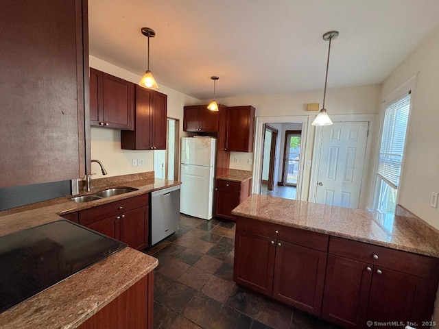 273 Peck Ave, West Haven, CT 06516 - kitchen with a sink, freestanding refrigerator, stainless steel dishwasher, stove, and a peninsula