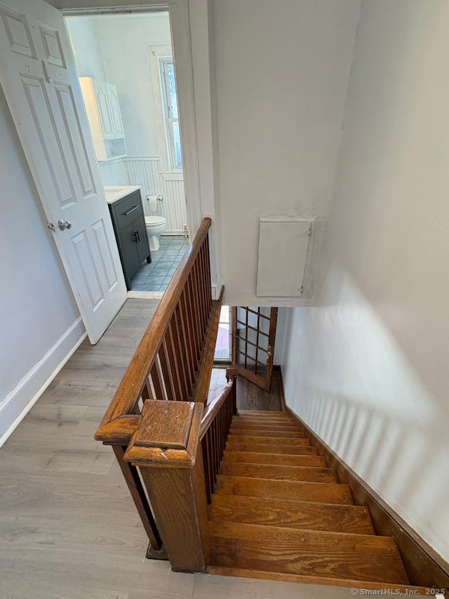273 Peck Ave, West Haven, CT 06516 - stairs with wood finished floors and baseboards