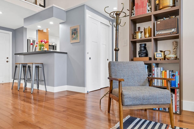 4 Coggswell St Unit 2, Stonington, CT 06379 - living area with hardwood / wood-style floors, baseboards, and recessed lighting