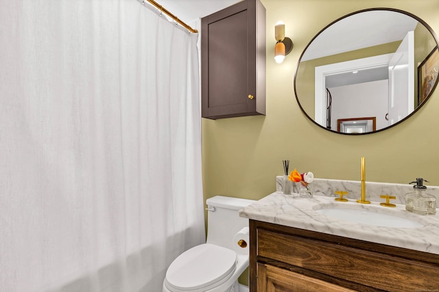 4 Coggswell St Unit 2, Stonington, CT 06379 - bathroom featuring vanity, toilet, and shower / bathtub combination with curtain