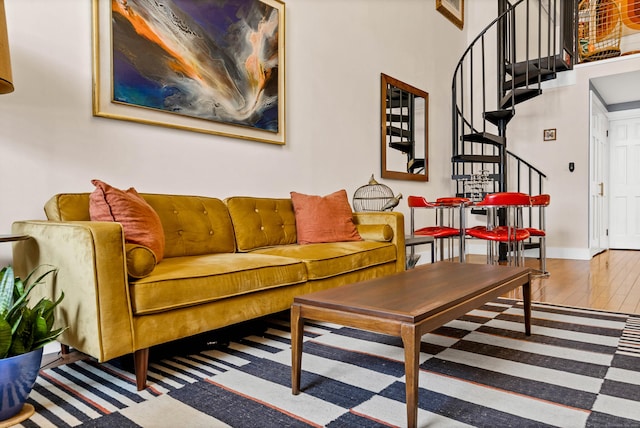 4 Coggswell St Unit 2, Stonington, CT 06379 - living room with wood finished floors, stairs, and baseboards