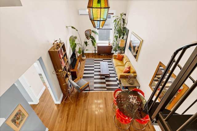 4 Coggswell St Unit 2, Stonington, CT 06379 - hallway with hardwood / wood-style floors, baseboards, and stairs