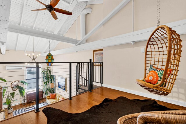 4 Coggswell St Unit 2, Stonington, CT 06379 - living area with wood finished floors, ceiling fan, high vaulted ceiling, a chandelier, and beam ceiling
