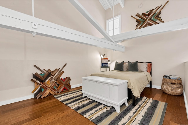 4 Coggswell St Unit 2, Stonington, CT 06379 - bedroom featuring a towering ceiling, dark wood-style floors, beam ceiling, and baseboards