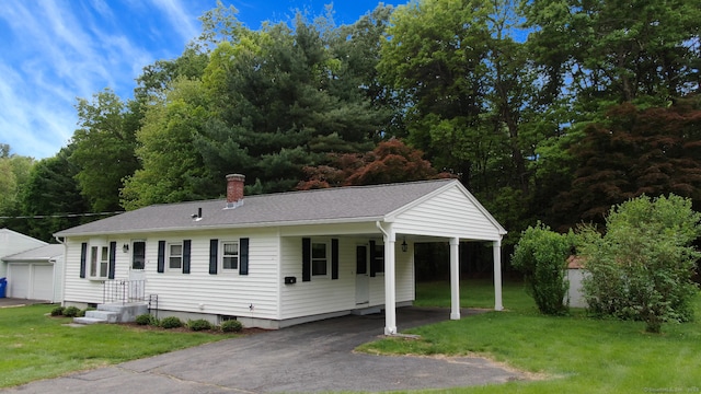 14 Winding Ln, Enfield, CT 06082 - ranch-style house with driveway, an attached carport, a front yard, and a chimney