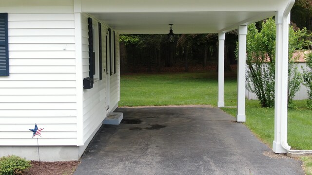 14 Winding Ln, Enfield, CT 06082 - view of patio / terrace with an attached carport