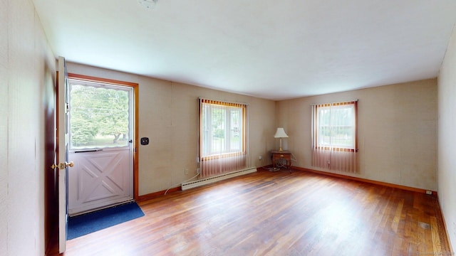 14 Winding Ln, Enfield, CT 06082 - foyer with a baseboard heating unit, wood finished floors, and baseboards