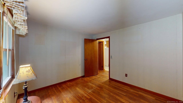 14 Winding Ln, Enfield, CT 06082 - empty room with wood finished floors and baseboards