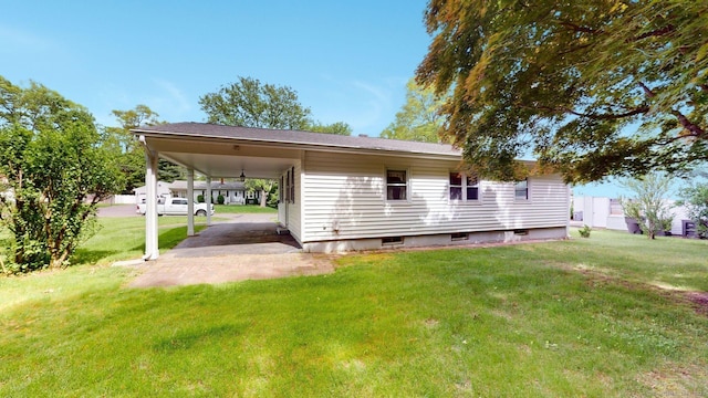 14 Winding Ln, Enfield, CT 06082 - back of house featuring a yard and a carport
