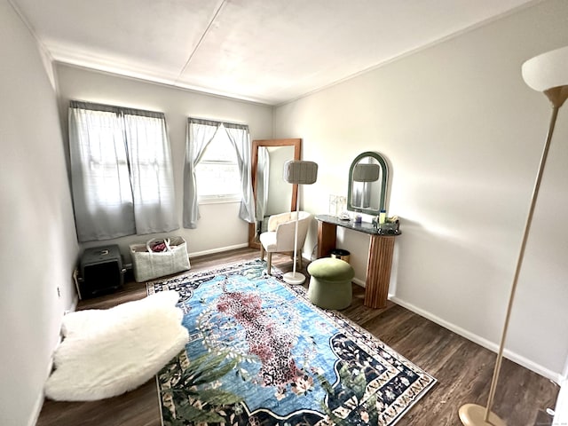 living area featuring wood finished floors and baseboards