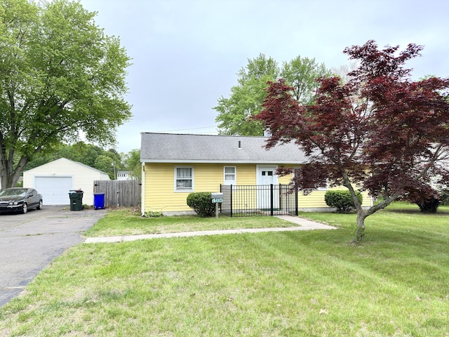 view of front of house with driveway, a garage, and roof with shingles
