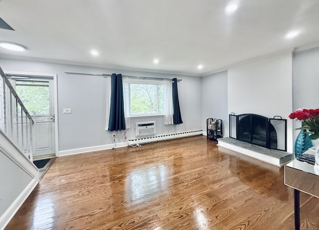 22 Palmer Ave, Stamford, CT 06902 - unfurnished living room with crown molding, a baseboard radiator, healthy amount of natural light, wood finished floors, and stairs