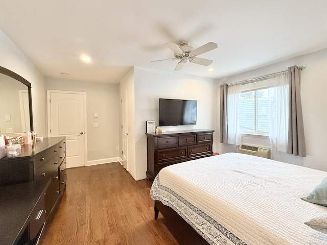 22 Palmer Ave, Stamford, CT 06902 - bedroom with dark wood-style flooring, arched walkways, recessed lighting, ceiling fan, and a wall mounted AC