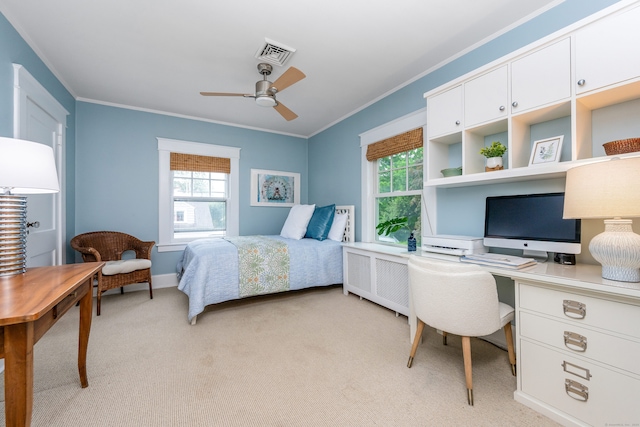 bedroom featuring crown molding, multiple windows, light carpet, baseboards, and a ceiling fan