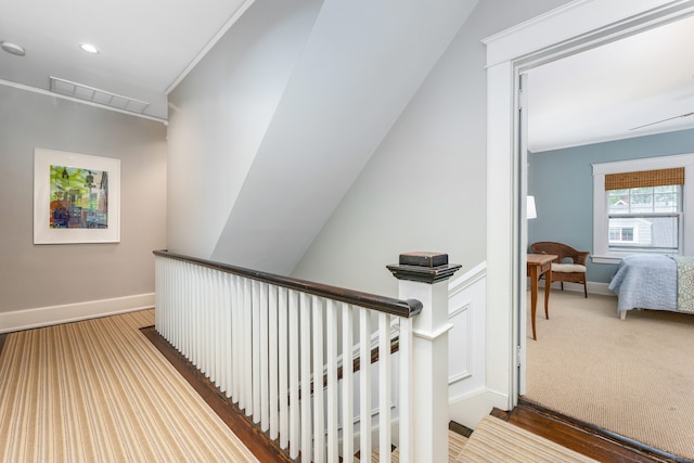 stairway with carpet floors, baseboards, and recessed lighting