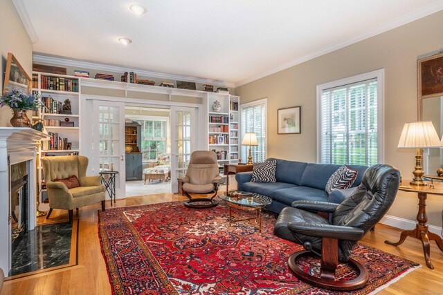 2 Plum Tree Cir, Farmington, CT 06032 - living room with crown molding, a high end fireplace, wood finished floors, and french doors