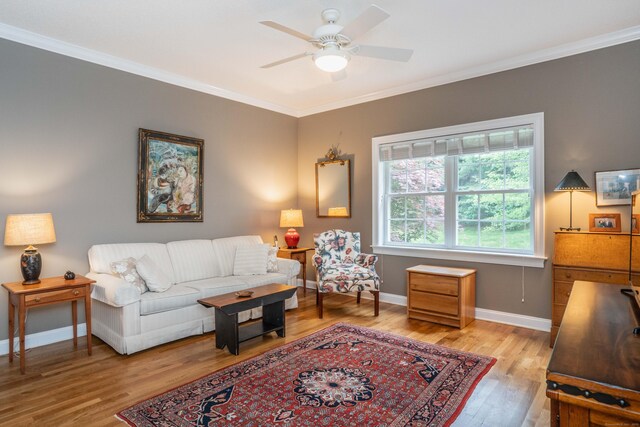 2 Plum Tree Cir, Farmington, CT 06032 - living area with light wood-type flooring, crown molding, baseboards, and a ceiling fan