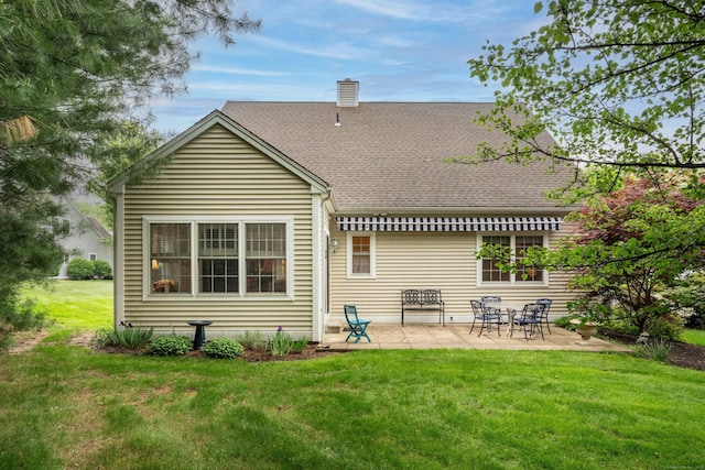 2 Plum Tree Cir, Farmington, CT 06032 - rear view of property with a shingled roof, a chimney, a patio, and a yard