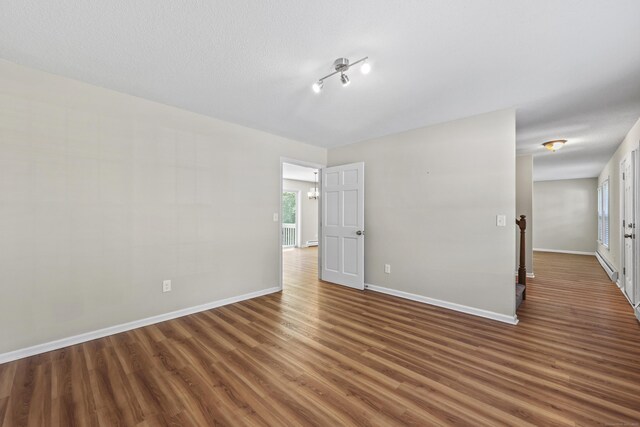 5 Nutmeg Ln, East Hampton, CT 06424 - empty room with wood finished floors and baseboards