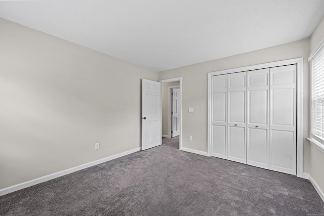 5 Nutmeg Ln, East Hampton, CT 06424 - unfurnished bedroom featuring carpet floors, baseboards, and a closet