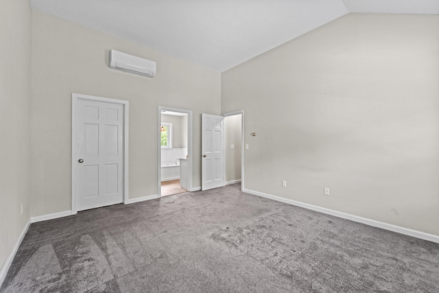 5 Nutmeg Ln, East Hampton, CT 06424 - unfurnished bedroom with a wall unit AC, carpet flooring, baseboards, high vaulted ceiling, and ensuite bathroom
