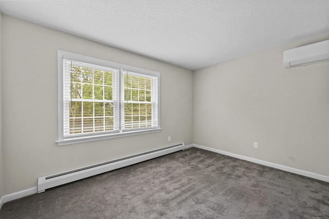 5 Nutmeg Ln, East Hampton, CT 06424 - carpeted empty room with a baseboard radiator, a wall mounted AC, a textured ceiling, and baseboards