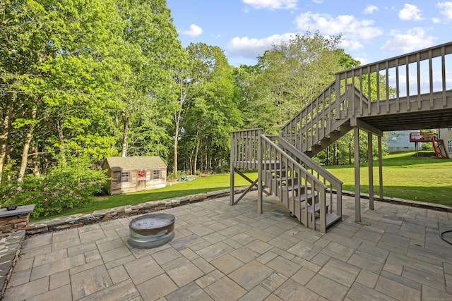 5 Nutmeg Ln, East Hampton, CT 06424 - view of patio featuring stairs, an outdoor structure, a fire pit, and a deck