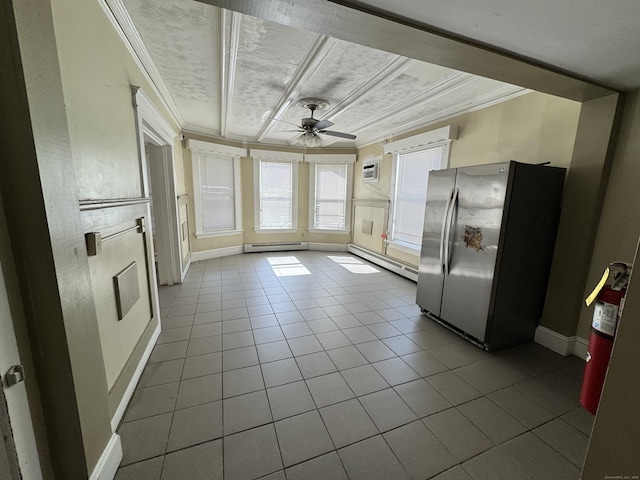 485 Laurel Ave, Bridgeport, CT 06605 - kitchen with freestanding refrigerator, a baseboard radiator, a baseboard heating unit, tile patterned flooring, and ornamental molding