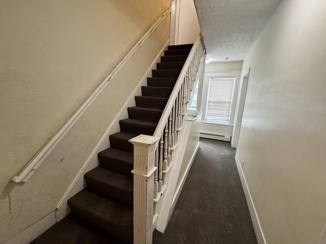485 Laurel Ave, Bridgeport, CT 06605 - stairway featuring a baseboard radiator, a textured ceiling, carpet, and baseboards