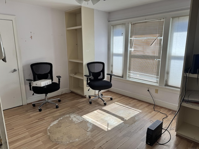 485 Laurel Ave, Bridgeport, CT 06605 - office featuring light wood-style flooring, ceiling fan, built in features, and baseboards