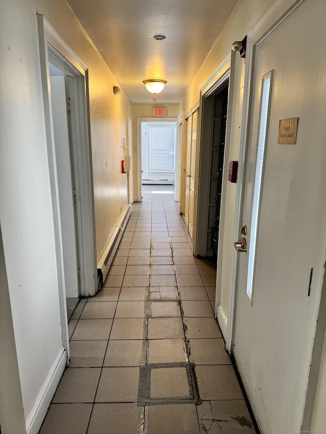 485 Laurel Ave, Bridgeport, CT 06605 - corridor featuring a baseboard radiator and baseboards