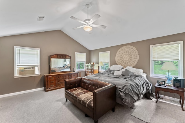 bedroom with lofted ceiling, baseboards, light colored carpet, ceiling fan, and cooling unit