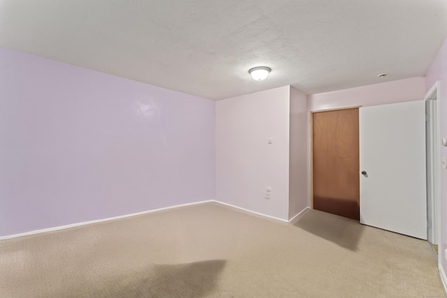spare room with carpet