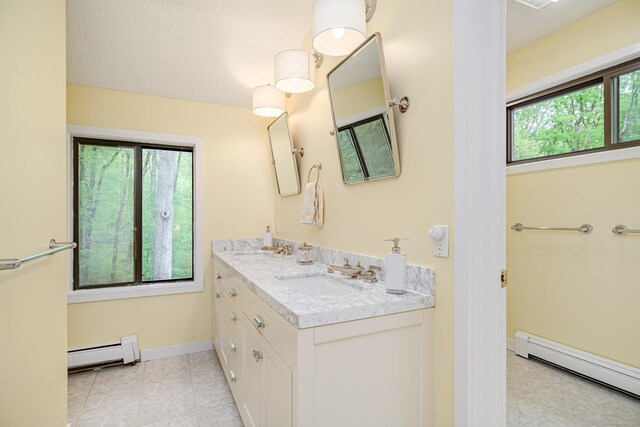 22 Kristy Dr, Bethel, CT 06801 - full bathroom with baseboard heating and double vanity