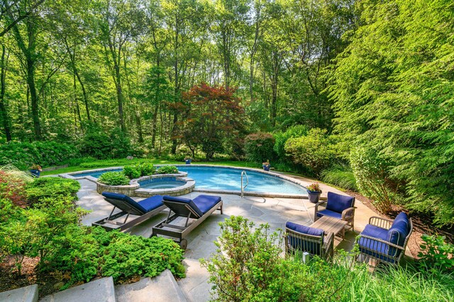 22 Kristy Dr, Bethel, CT 06801 - swimming pool featuring an in-ground hot tub, a patio, and a view of trees